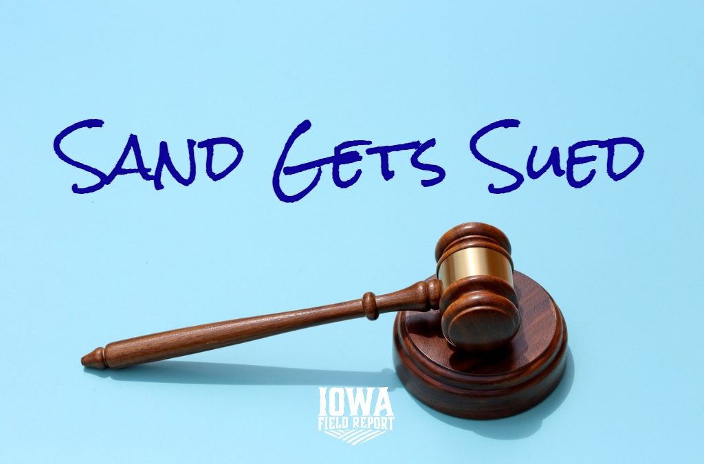 Sand Gets Sued