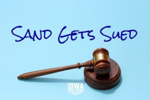 Sand Gets Sued